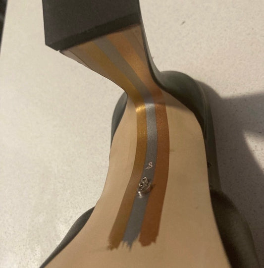 Black leather clogs