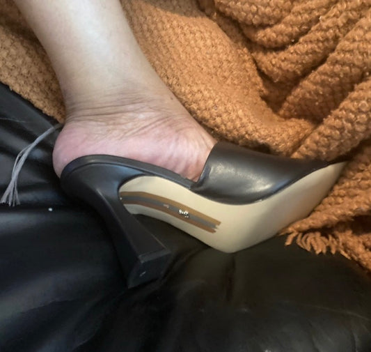 Black leather clogs